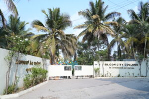 Campus entrance of one of the best institute for MBA in Bangalore offering a vibrant learning environment.