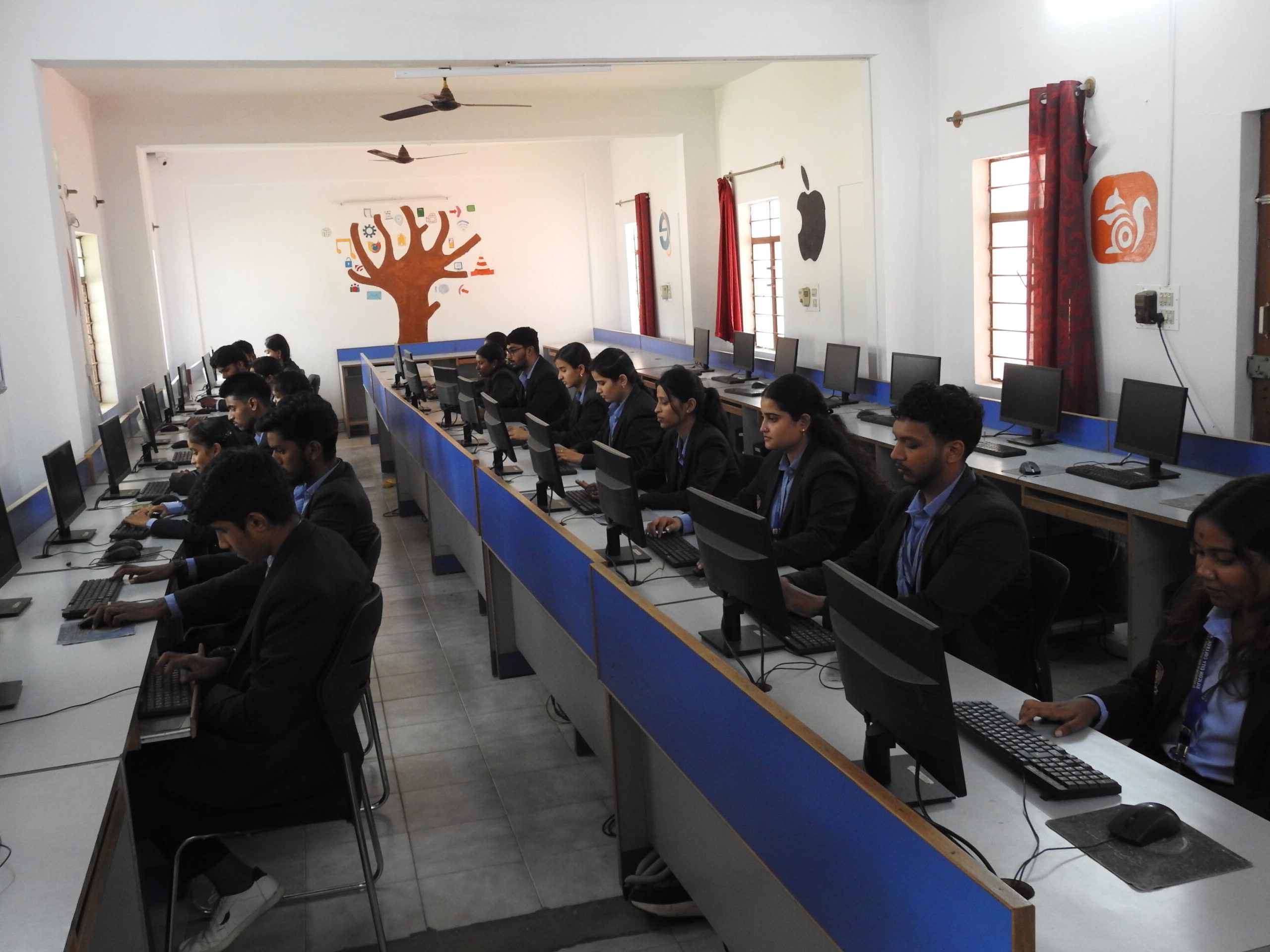 Computer laboratory at one of the top BCA colleges in Bangalore showcasing academic best practices and practical learning.